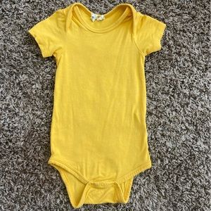 Kyte baby mustard bodysuit